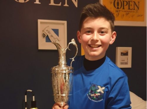 Joshua with the famous Claret Jug.