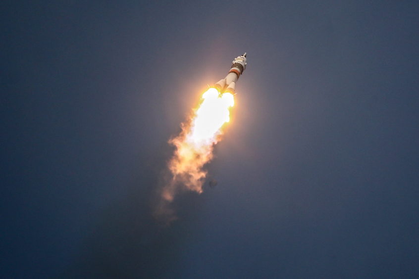 A Soyuz-FG rocket booster carrying the Soyuz MS-11 spacecraft with Roscosmos cosmonaut Oleg Kononenko, NASA astronaut Anne McClain, and Canadian Space Agency (CSA) astronaut David Saint-Jacques aboard lifts off to the International Space Station (ISS) from the Baikonur Cosmodrome.