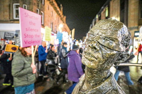 The scene at a recent Perth Reclaim the Night March, a procession led by the local rape and sex assault crisis centre to help women feel safer and less afraid in the city centre after dark.