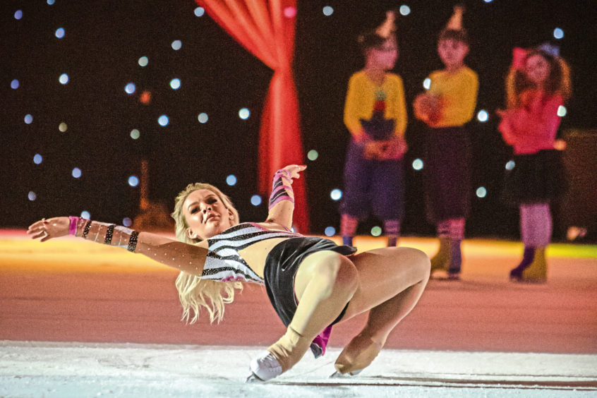 A performer shows off her skills art the Dundee Ice Arena show.