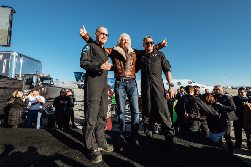 Sir Richard Branson with pilots Frederick Sturckow (left) and Mark Stucky (right) who took part in the Virgin Galactic test flight of SpaceShipTwo,