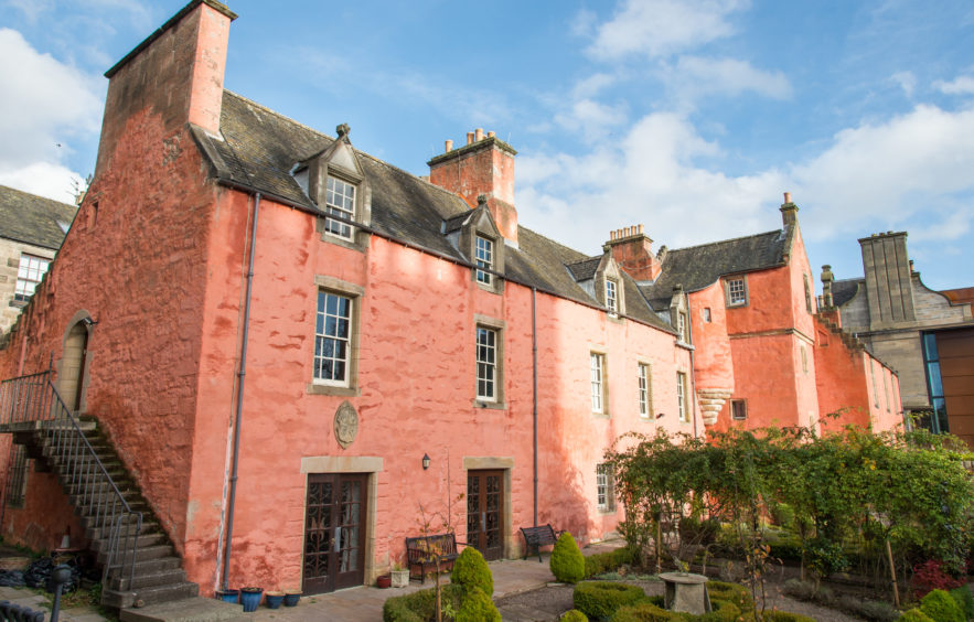 The pink Abbot House in Dunfermline. 