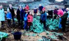 Volunteers filled a skip with litter and fishing debris from the beach near Crail