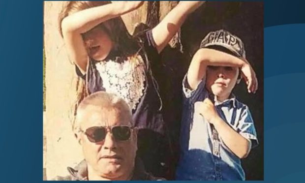 Derek Wilkie with his grandchildren Maia and Fellan.