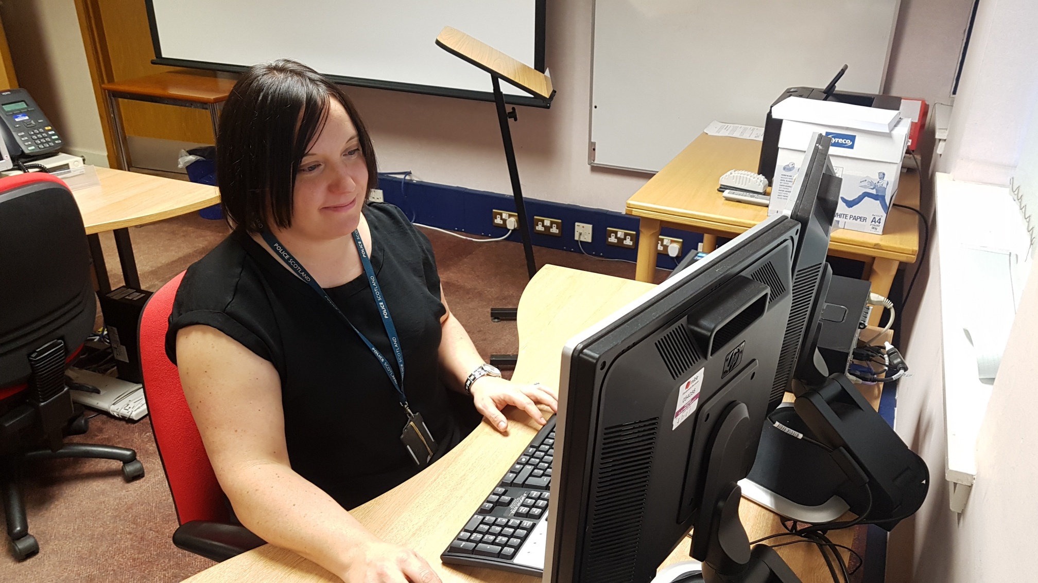 Detective Constable Lesley Couper answering messages during the Facebook event.
