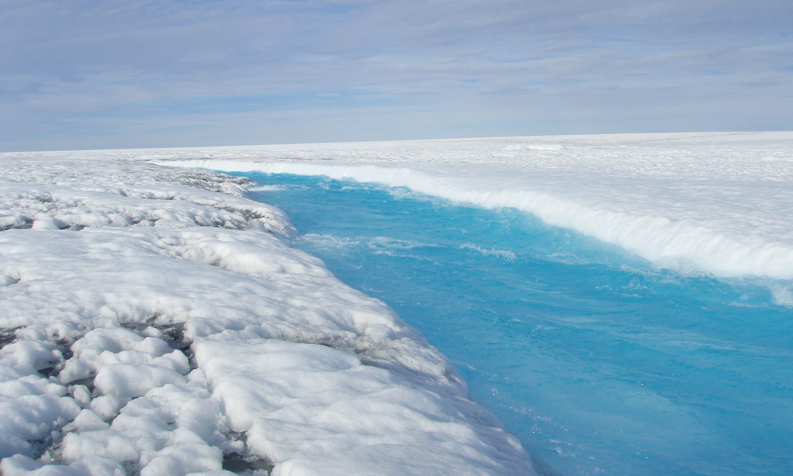 A melt stream on the Greenland ice sheet, where melting has accelerated to unprecedented rates in the face of rising temperatures, analysis of ice cores has found.