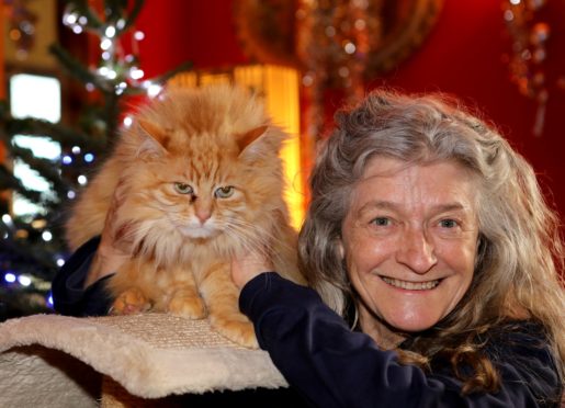 Elle Stirling from Kinettles near Forfar with one of her cats "Squirrell".