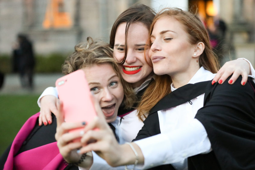 Magdalena Pribanva, Zofia Ossowska and Lisa Maria Frending celebrating after graduation.
