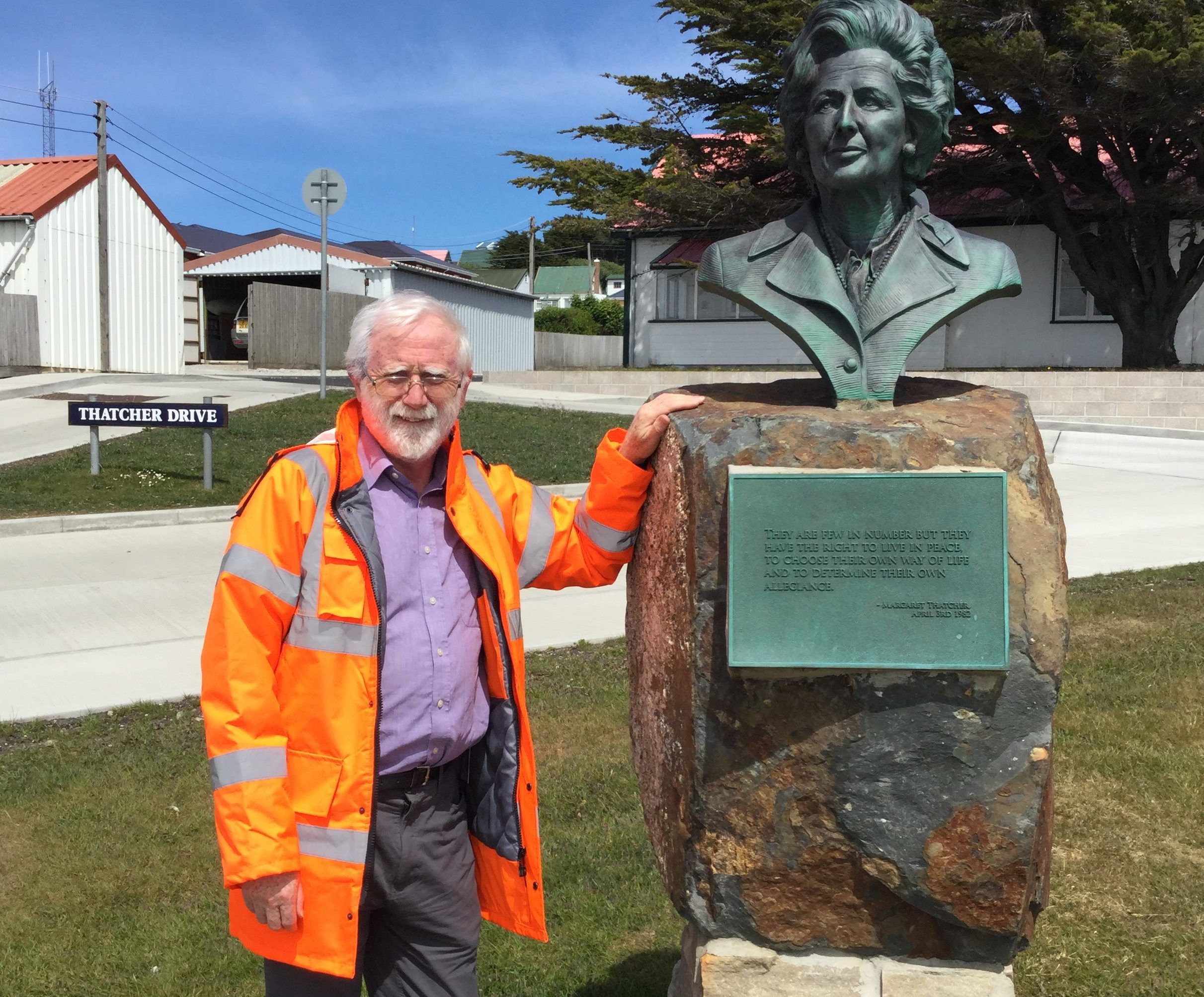 Graeme Law in the Falklands with a bust of former British PM Margaret Thatcher