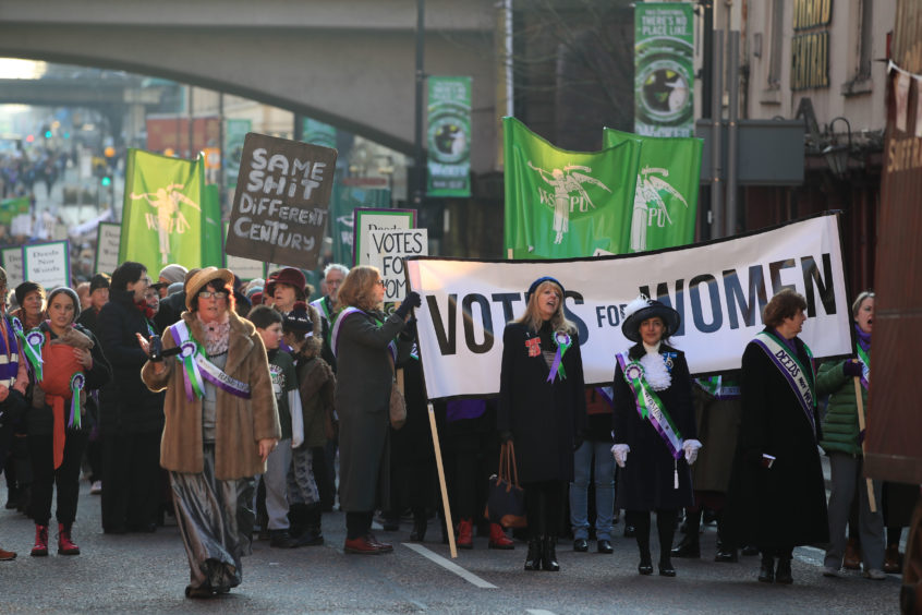 A march through Manchester ahead of the unveiling of the Emmeline Pankhurst statue in St Peter's Square in Manchester,