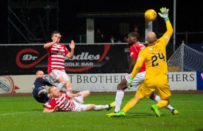 Kenny Miller opens the scoring for Dundee.