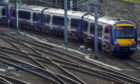 A Scotrail train arrives at Edinburgh Waverley Station.
