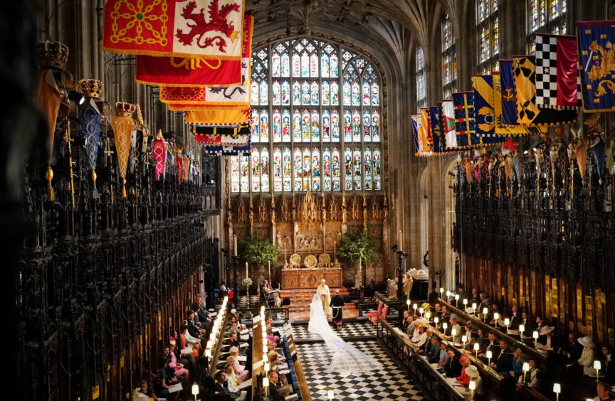 Prince Harry and Meghan Markle in St George's Chapel. Owen Humphreys/PA Wire