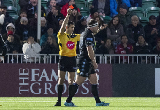 Referee Frank Murphy s ends off Alex Allan in last weekend's game at Scotstoun.