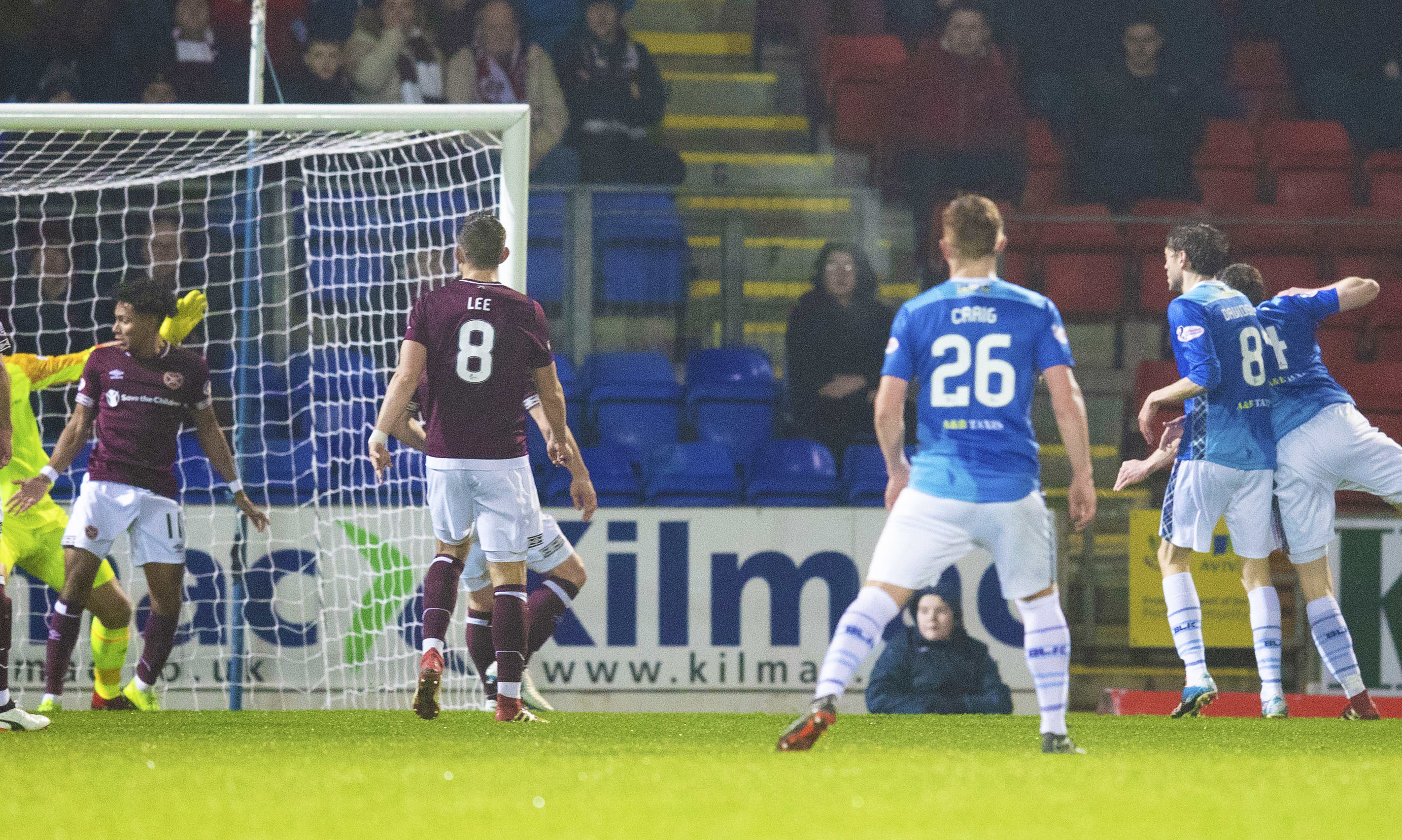 St Johnstone's Blair Alston (right) strikes to level things for the hosts.