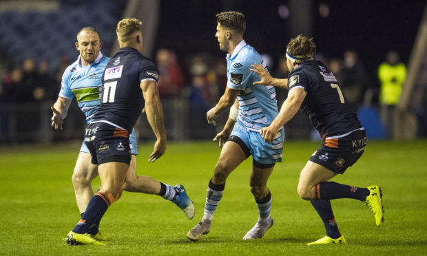 Adam Hastings sees his pass intercepted by Edinburgh's Duhan van der Merwe for the opening try in the 1872 Cup clash at Murrayfield.