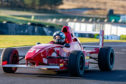 Gayle roars around the race track at Knockhill in a Formula Race Car.