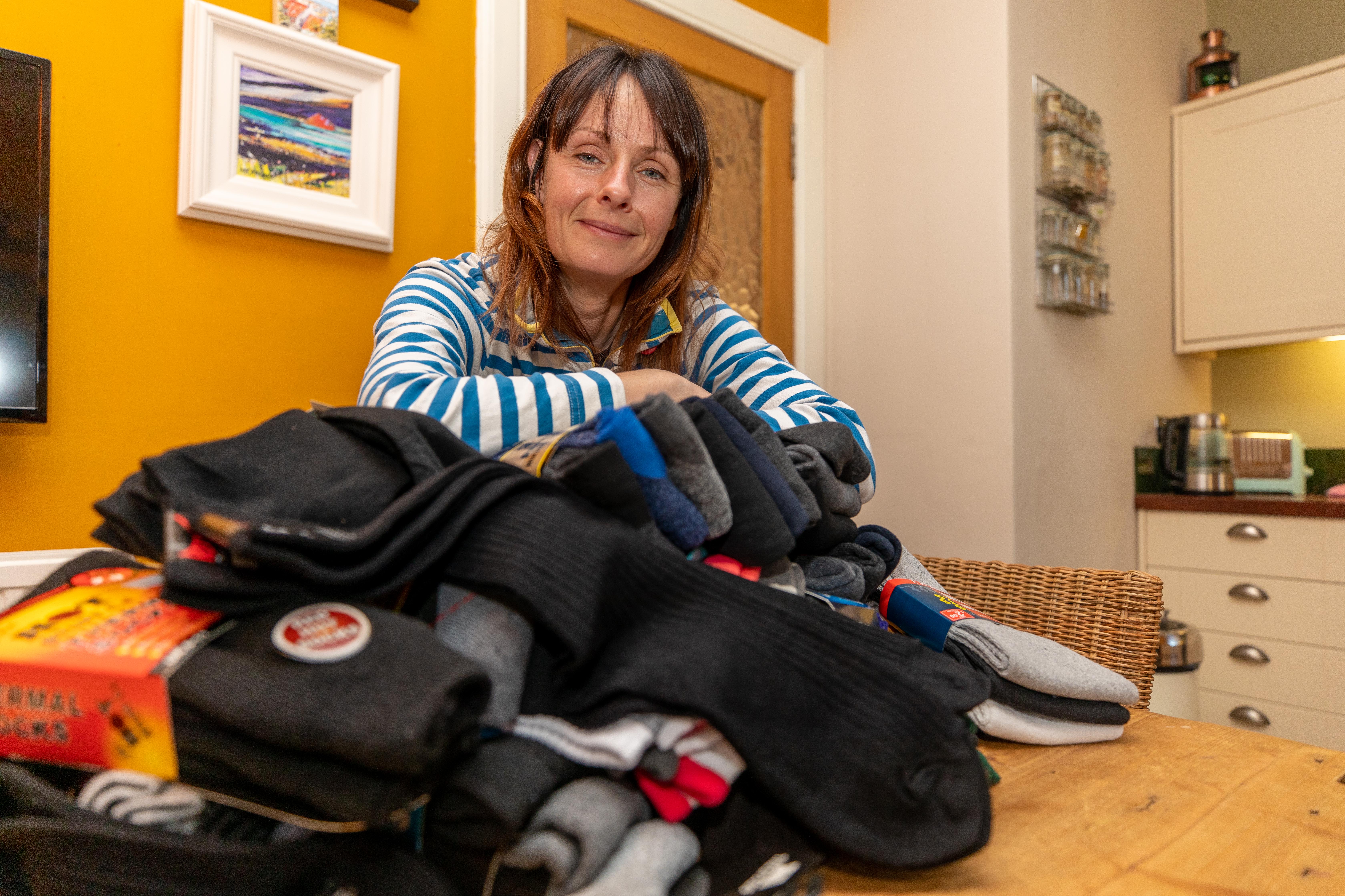 Jennifer Jones, from St Monans, is collecting unwanted Christmas sock gifts for the homeless.