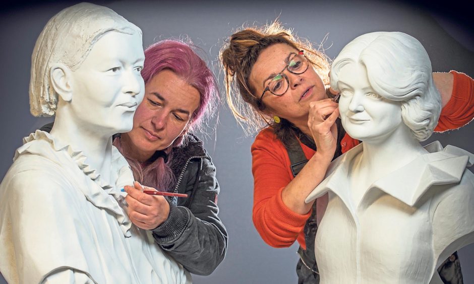 The National Wallace Monument unveils the busts of Scotland’s Heroines - Mary Slessor.

The National Wallace Monument’s ‘Scotland’s Heroines’ project

 

Sculptors, Graciela Ainsworth (orange top) and  Csilla Karsay (pink hair)

are putting the finishing touches to two busts depicting iconic Scottish women.

 

The busts of Mary Slessor and Maggie Keswick Jencks will join a collection of busts of Scottish heroes at The National Wallace Monument in Stirling.
