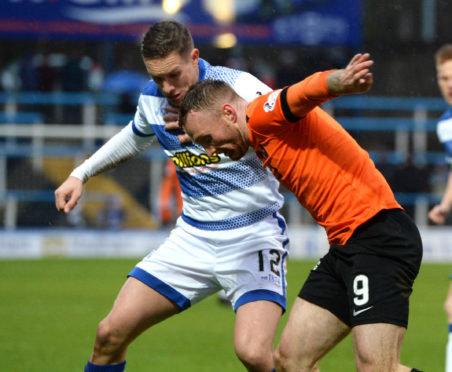 Craig Curran in action for United.