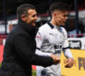 Dundee manager Jim McIntyre with Jesse Curran at full-time on Sunday.
