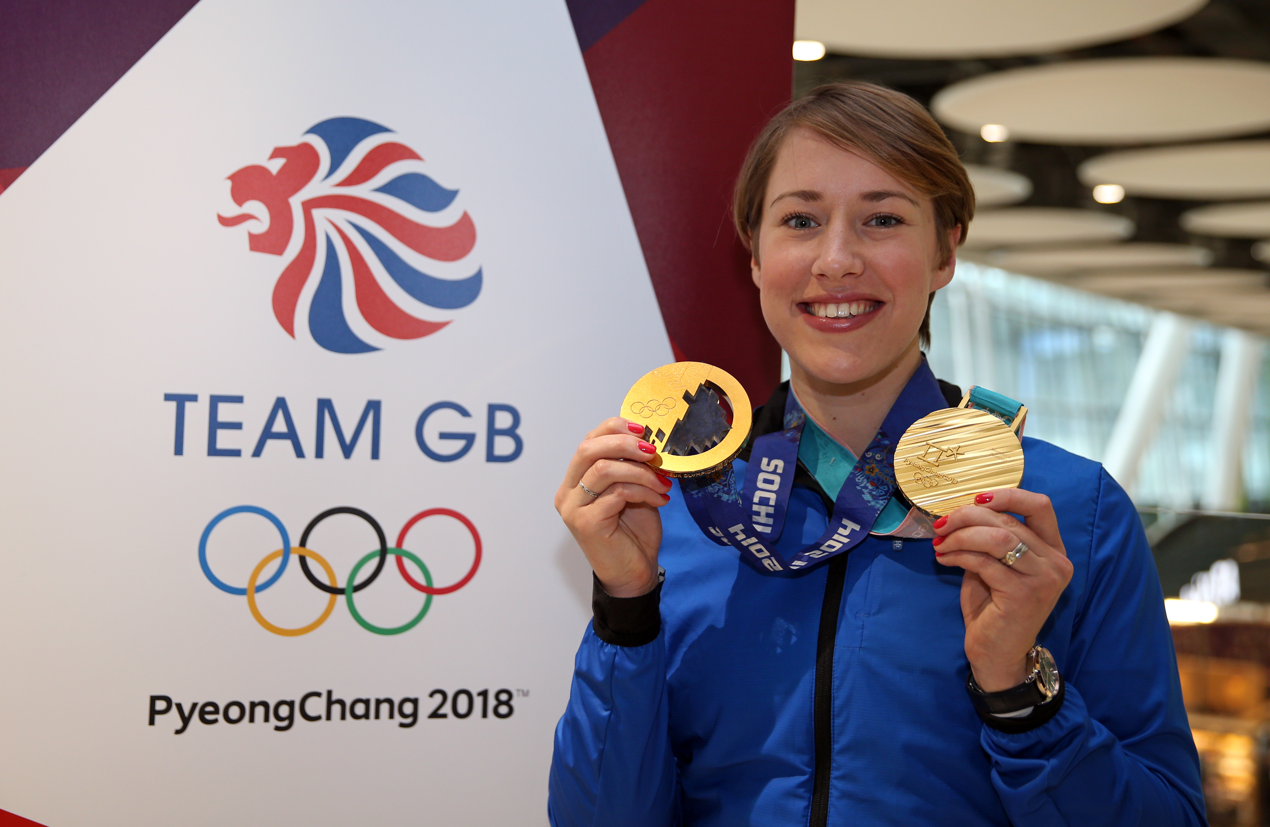 Lizzy Yarnold with her two Olympic golds.