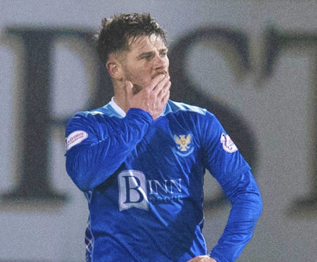 Matty Kennedy celebrates his penalty goal.