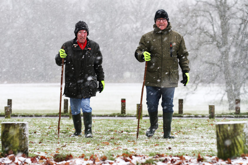 Brothers Jimmy and Harry Fraser from Lochee and Menziehill too a walk in the snow at Camperdown Park. Mhairi Edwards/DCT Media