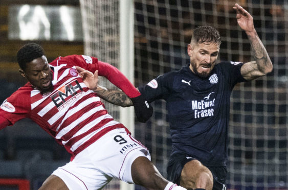 Martin Woods in action against Hamilton Accies.