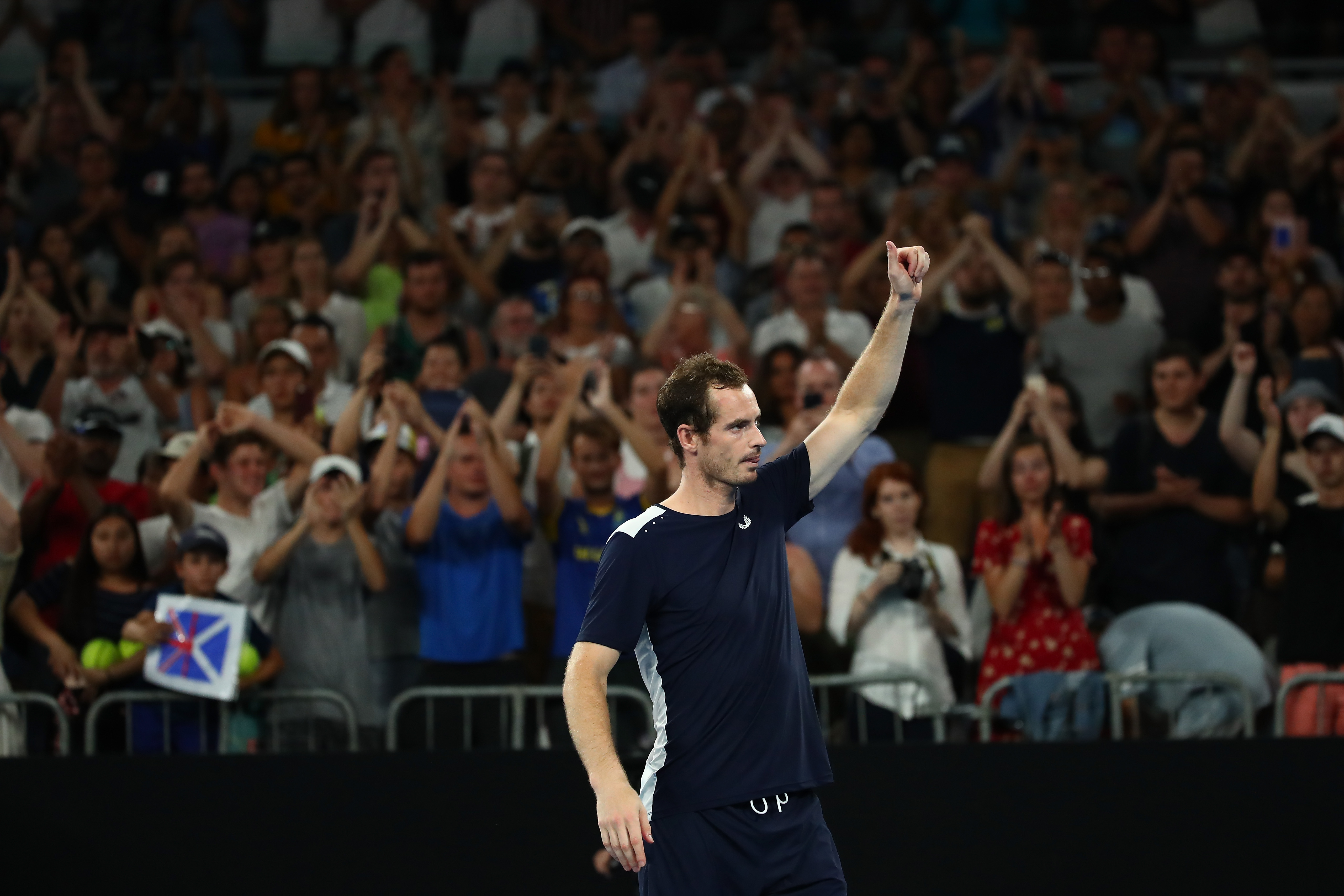 Andy Murray thanks the crowd after losing his first round match against Roberto Bautista Agut of Spain.