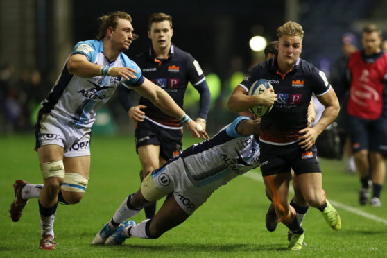 Duhan van der Merwe makes ground through defenders in Edinburgh's victory over Montpellier.