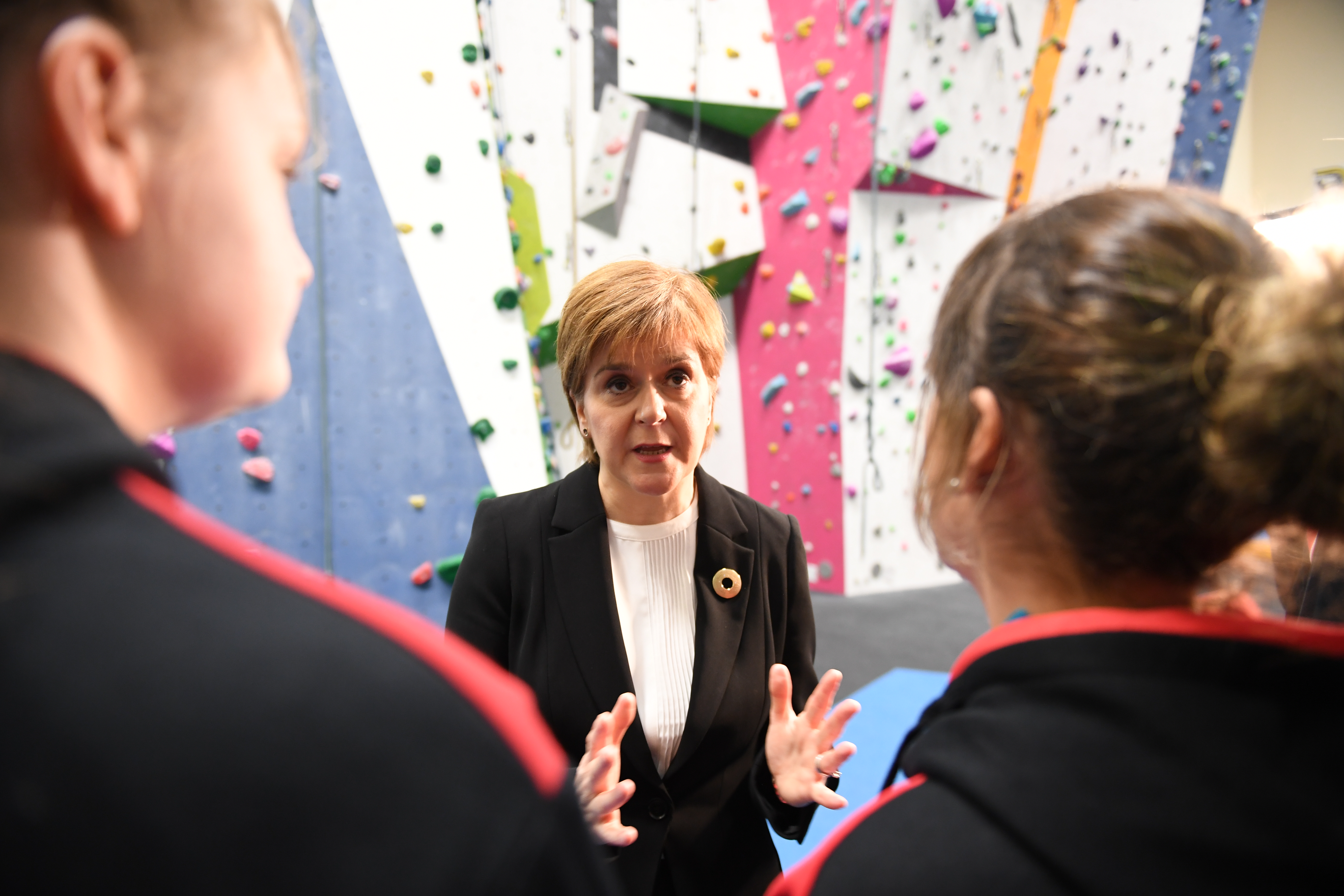 First Minister Nicola Sturgeon talks with eleven-year-old Holly Holmes from Boness during a visit to The Academy of Sport and Wellbeing, Perth College, in January 2019.