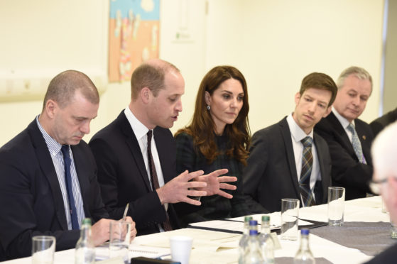 William and Kate meeting action group members.