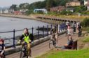 Cyclists at Grassy Beach in Dundee.