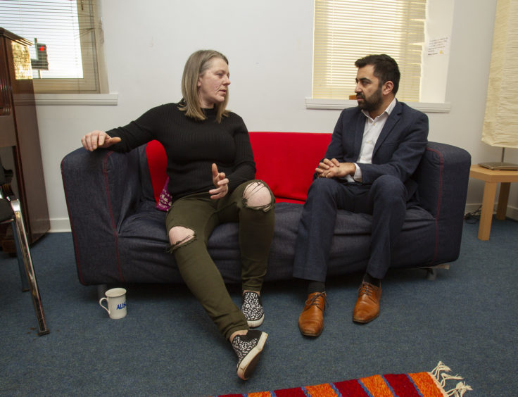 Justice Minister Humza Yousaf chatting to Kathleen Carnegie during a visit to the Glen Isla Project in 2019