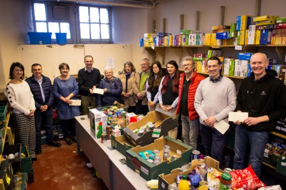 Stephen Gethins MP presenting all foodbanks in North East Fife - Cupar, Tay Bridgehead, East Neuk, Levenmouth and Storehouse (St Andrews) - with donations raised by the Parliamentary Christmas Card competition which raised £700 in total. Representatives of the foodbanks plus sponsors will be in attendance

In Pic.......... Lucy Mitchell, sponsor, Owen Hazel, sponsor, Fiona Finlay, Cupar foodbank, Stephen Gethins MP, Muriel O'neill, Lizzie Myles and David Myles, all Tay Bridgehead foodbank, Katie Scott and Stephanie Wilkie, from sponsors, Lindores Abbey Distillery, Stewart English, Levenmouth foodbank, Jim Cronin, St Andrews foodbank, Richard Wemyss, East Neuk foodbank,