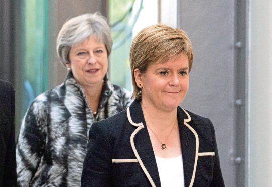 Prime Minister Theresa May and First Minister Nicola Sturgeon might both have to battle to keep their positions in 2019, says Jenny Hjul.