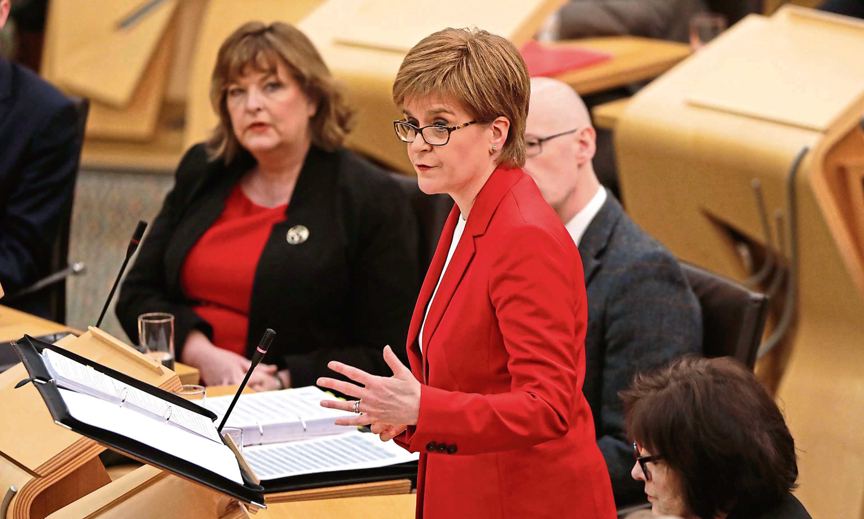 First Ministe, Nicola Sturgeon answers questions from party leaders during the final First Minister's Questions of 2018.