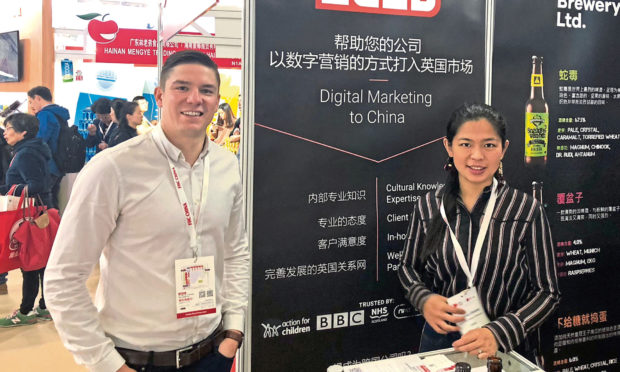 James Buchan and Xiaoxiao Zhang at Zudu stall at Food and Hotel China exhibition