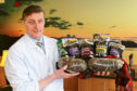 Perthshire butcher Simon Howie with a selection of haggis products.