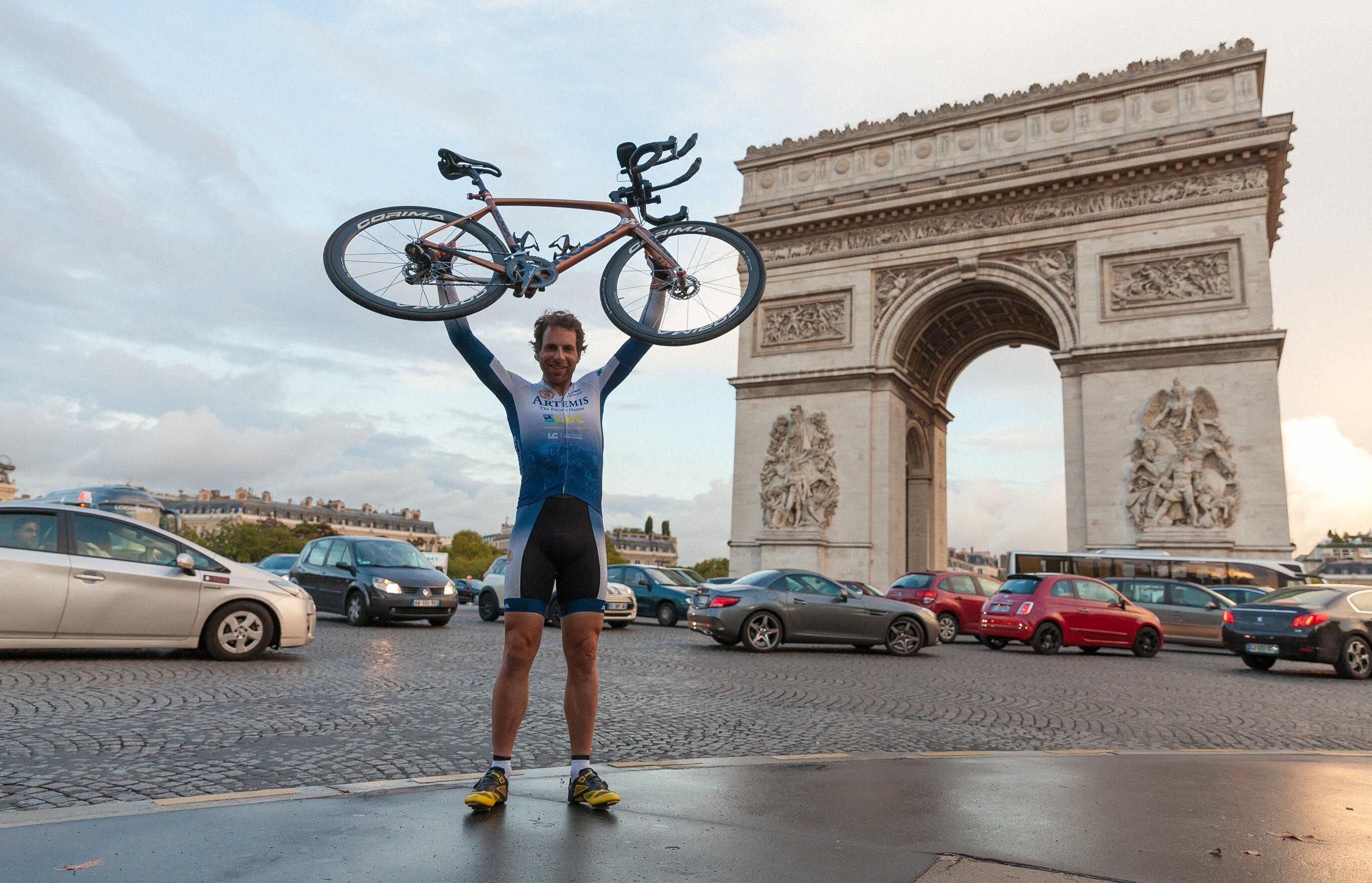 Mark Beaumont completed his record-breaking cycle around the world at the Arc De Triomphe in Paris in 2017