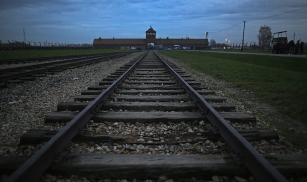 The railway track leads to the infamous 'Death Gate' at the Auschwitz II Birkenau extermination camp