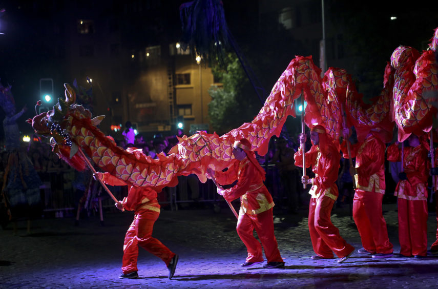 Dragon dancers take part in the inauguration performance.