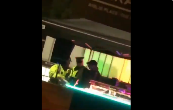 Video footage showed the DJ being led away by police on Saturday night