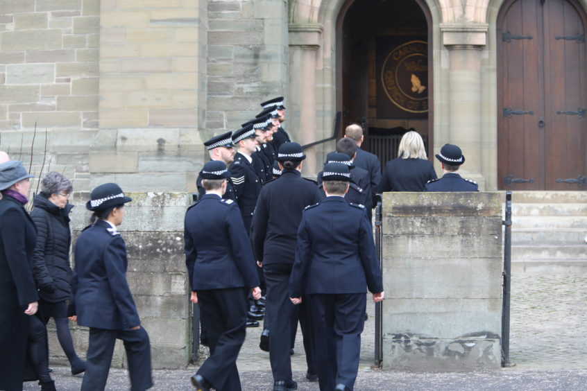 Officers line-up outside Carnoustie Church for the funeral of PC Dean Morrison.