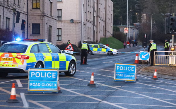 Police at Grampian Court, Perth.