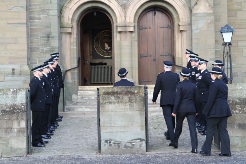 Officers line-up outside Carnoustie Church for the funeral of PC Dean Morrison.
