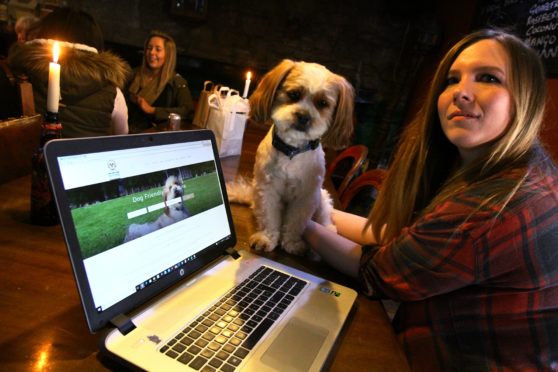 Katie McCandless Thomas with her Lhasa Apso, Baxter.