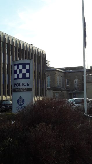 The flag at half mast at Tayside Police Division's Dundee HQ.