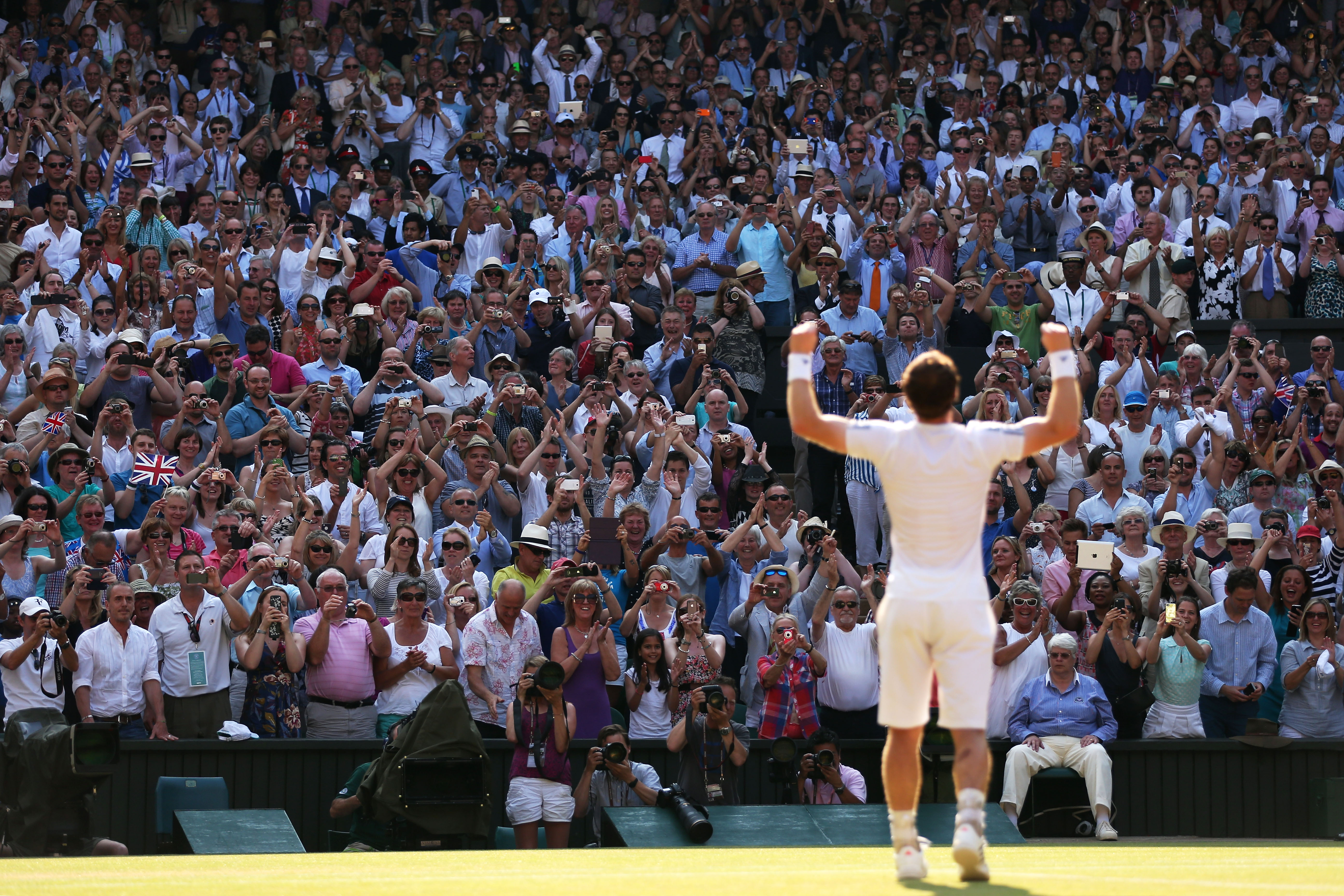 Andy Murray celebrates becoming Wimbledon champion in 2013. He was the first British winner since Fred Perry in 1936.
